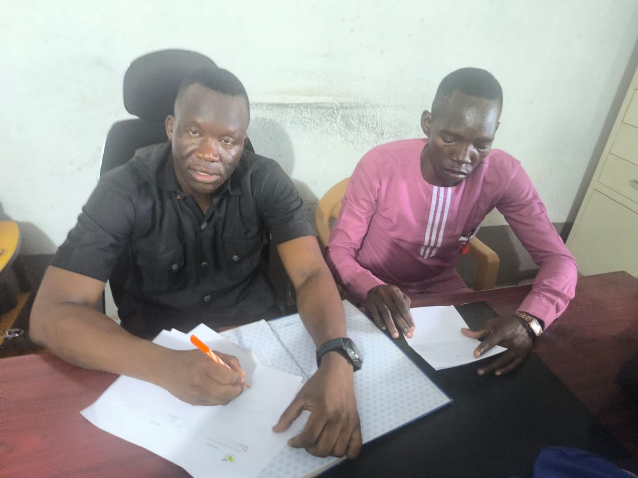 Advocate Emmanuel Sumagule Benaih Swaka during a legal consultation and case documentation at ILA in Juba.